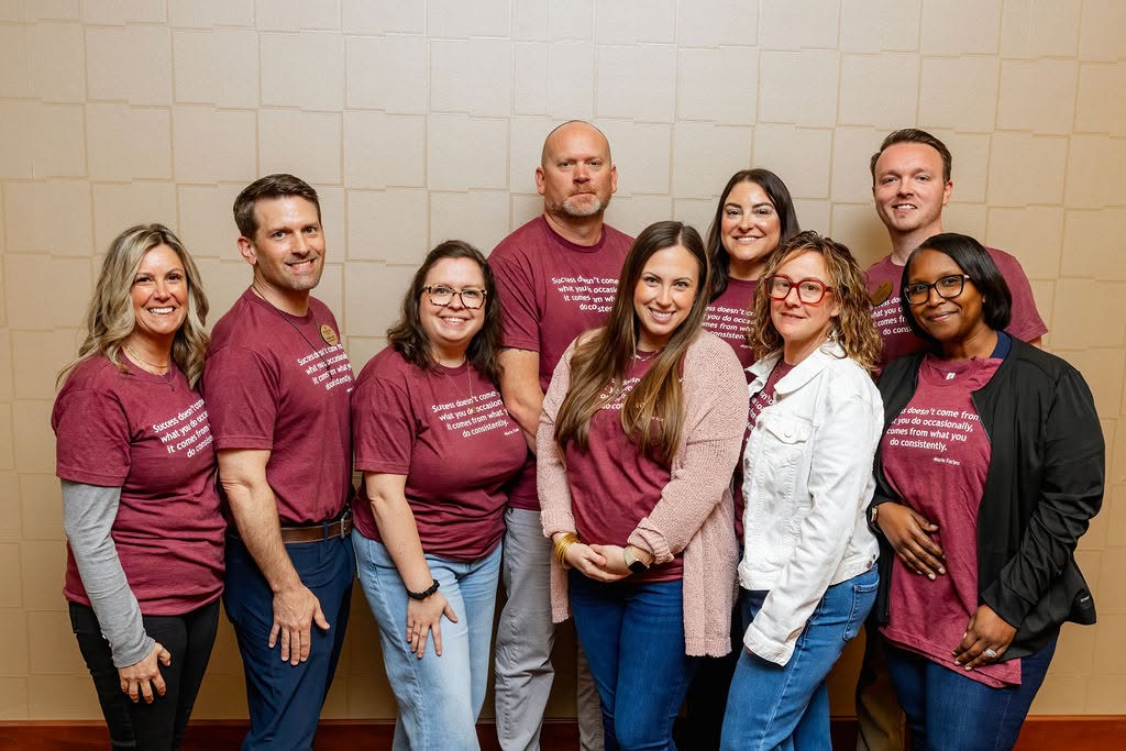 Group of Traditions employees during the annual company meeting