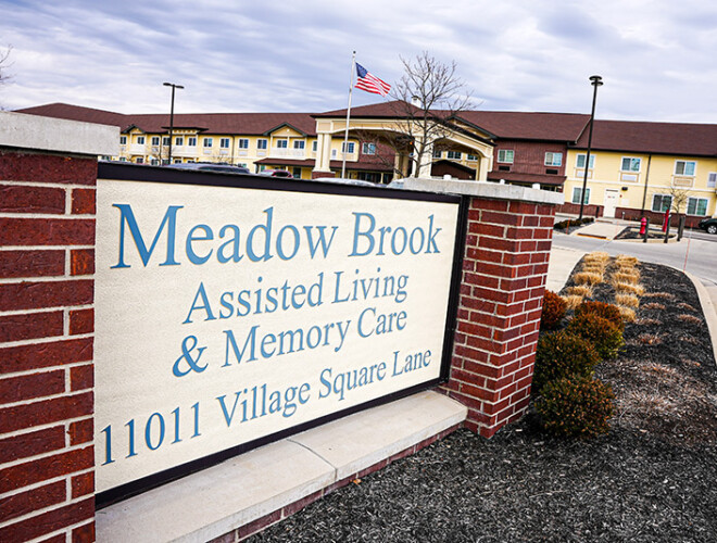 This is the front sign of Meadow Brook Assisted Living & Memory Care